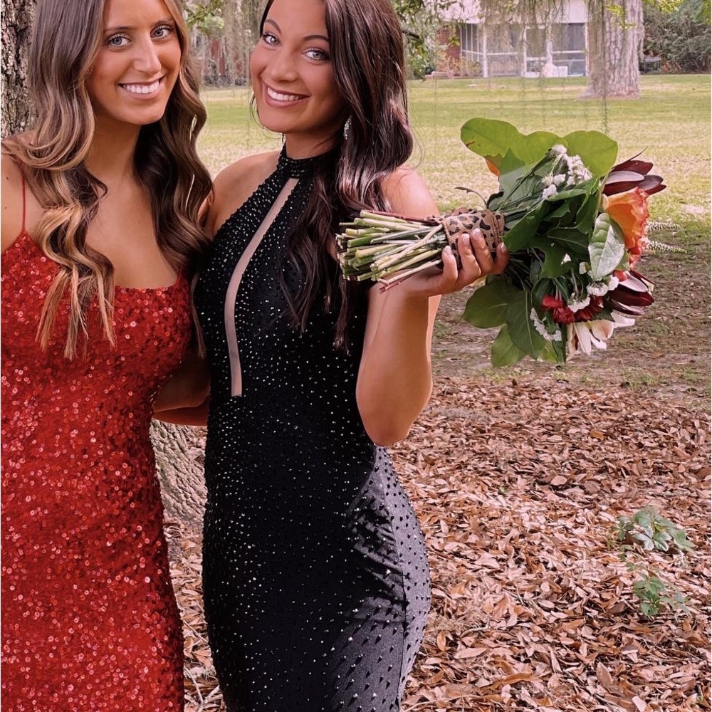 originally size 6, altered to a size 00 but can fit a size 4